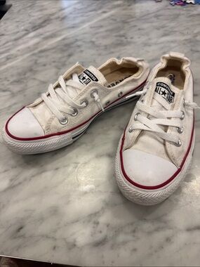 Converse Low-Top Sneakers in White with Red Accent